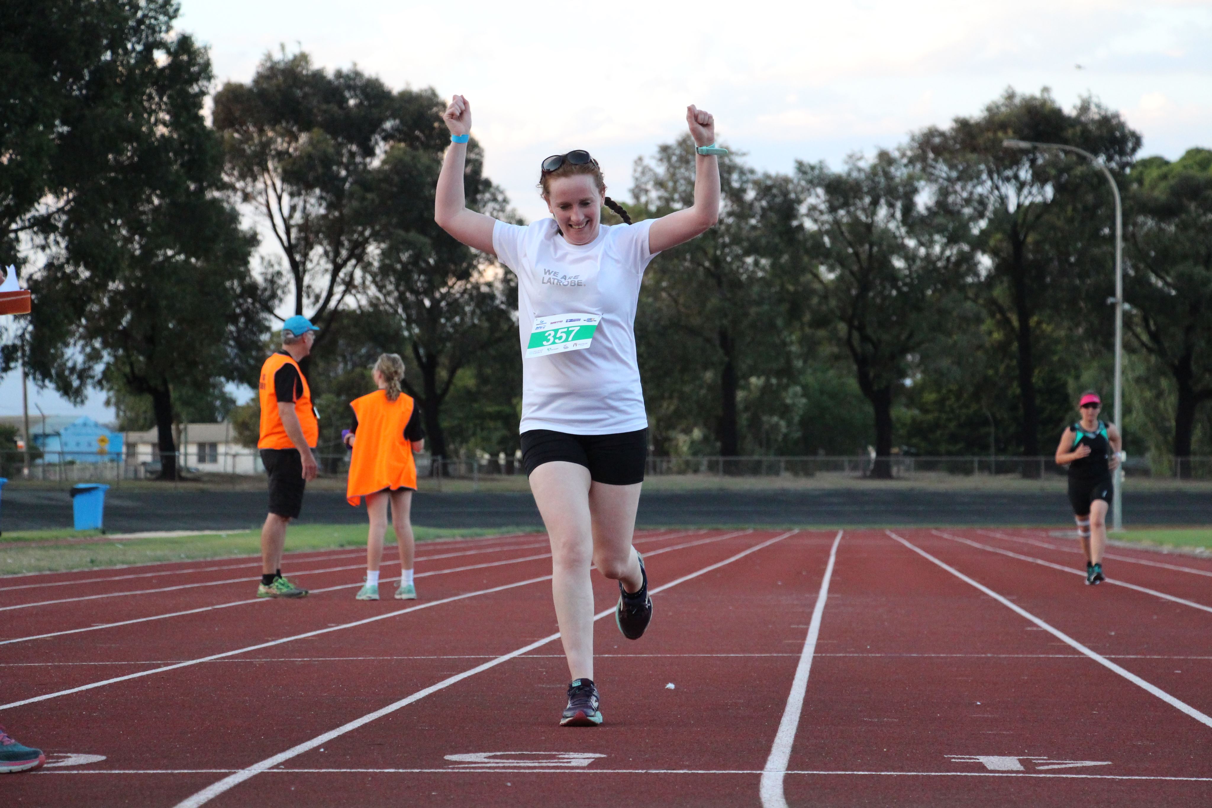 A Gippsland woman smiling after finishing a local walking group session